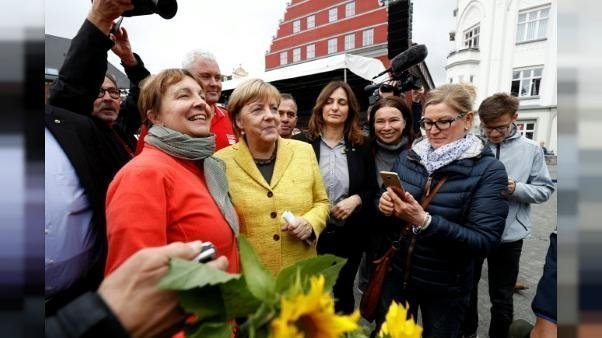 Fin de campagne en Allemagne: Merkel motive les siens, les populistes en embuscade
