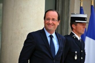 Hollande main dans la main avec les Marocains